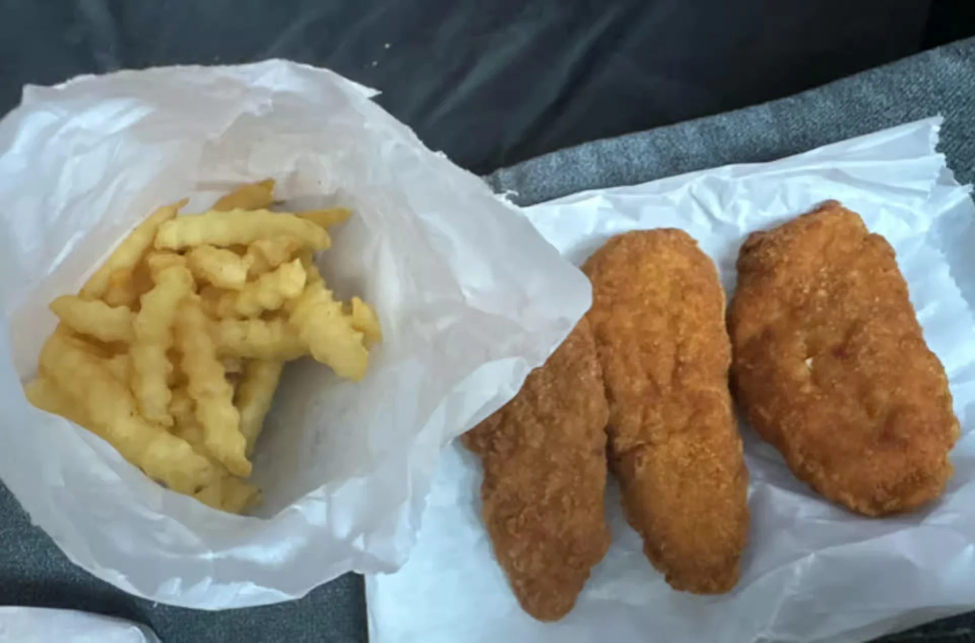 Chicken Tenders & Fries - Crispy chicken tenders served with french fries